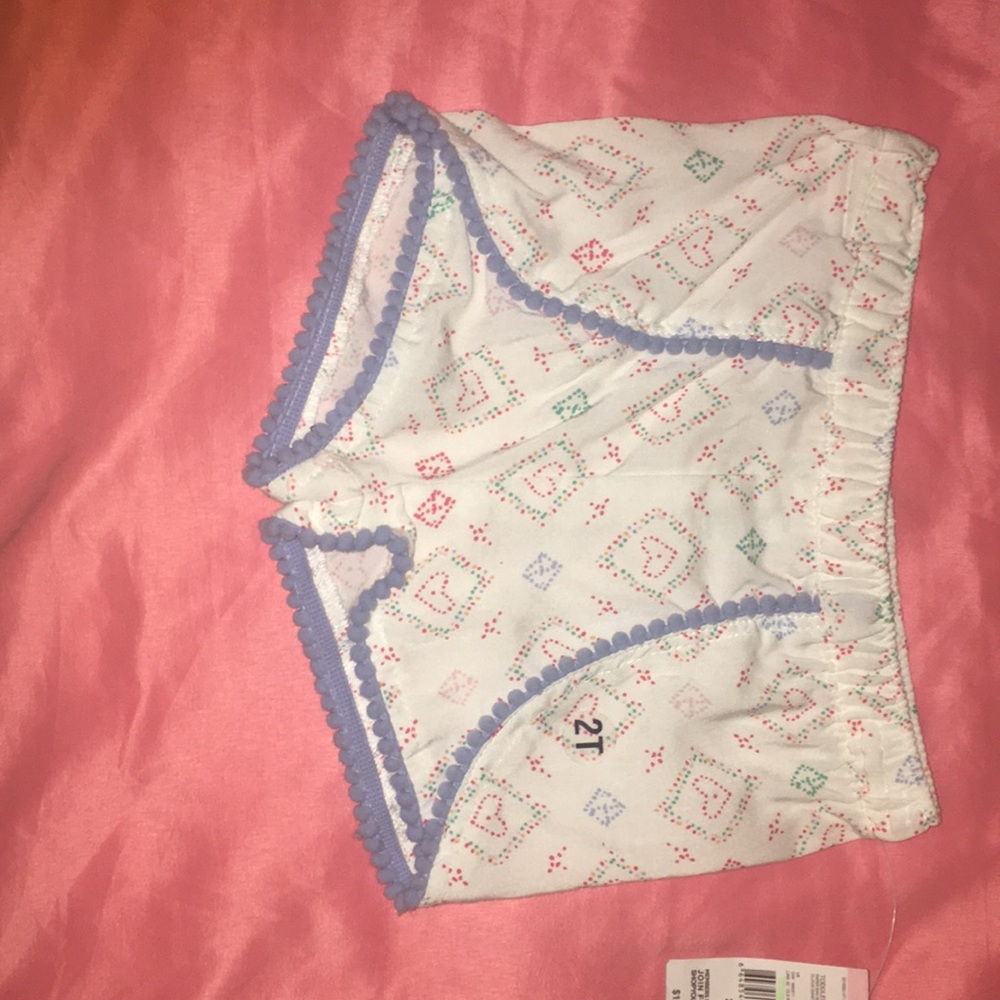 Paper bag shorts w/ pompon trims